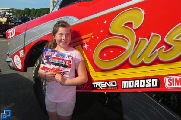 This is Carley. She gave me a such a big hug and said her family drove 10 hours from Canada just to come to this event. She said she loves our car and her teddy bear is named Susie Q. This made my day.