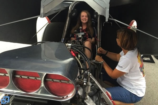 Hey Katie, how would you like to drive a funny car some day? I think she said yes.