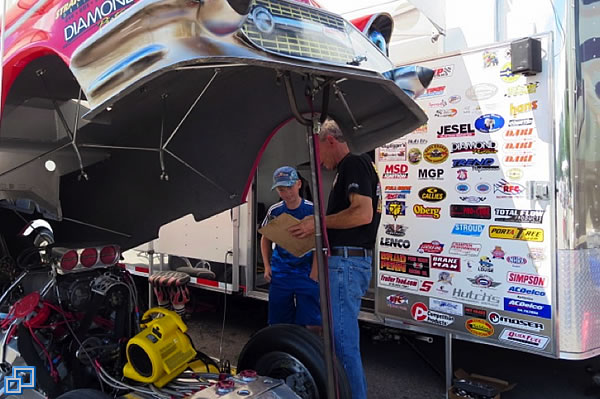 This young gear head gets a lesson on engine timing