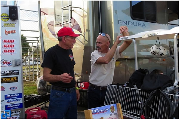 Steve and Joel Raymond discussing the run.